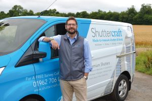 Shuttercraft van with a man in a shuttercraft uniform stood in front
