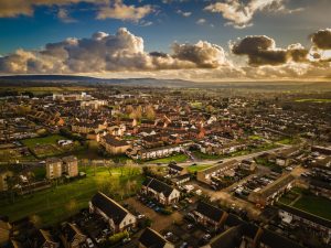 Aerial drone shot of the south side of Aylesbury, Buckinghamshire, with the Chiltern hills in the background.